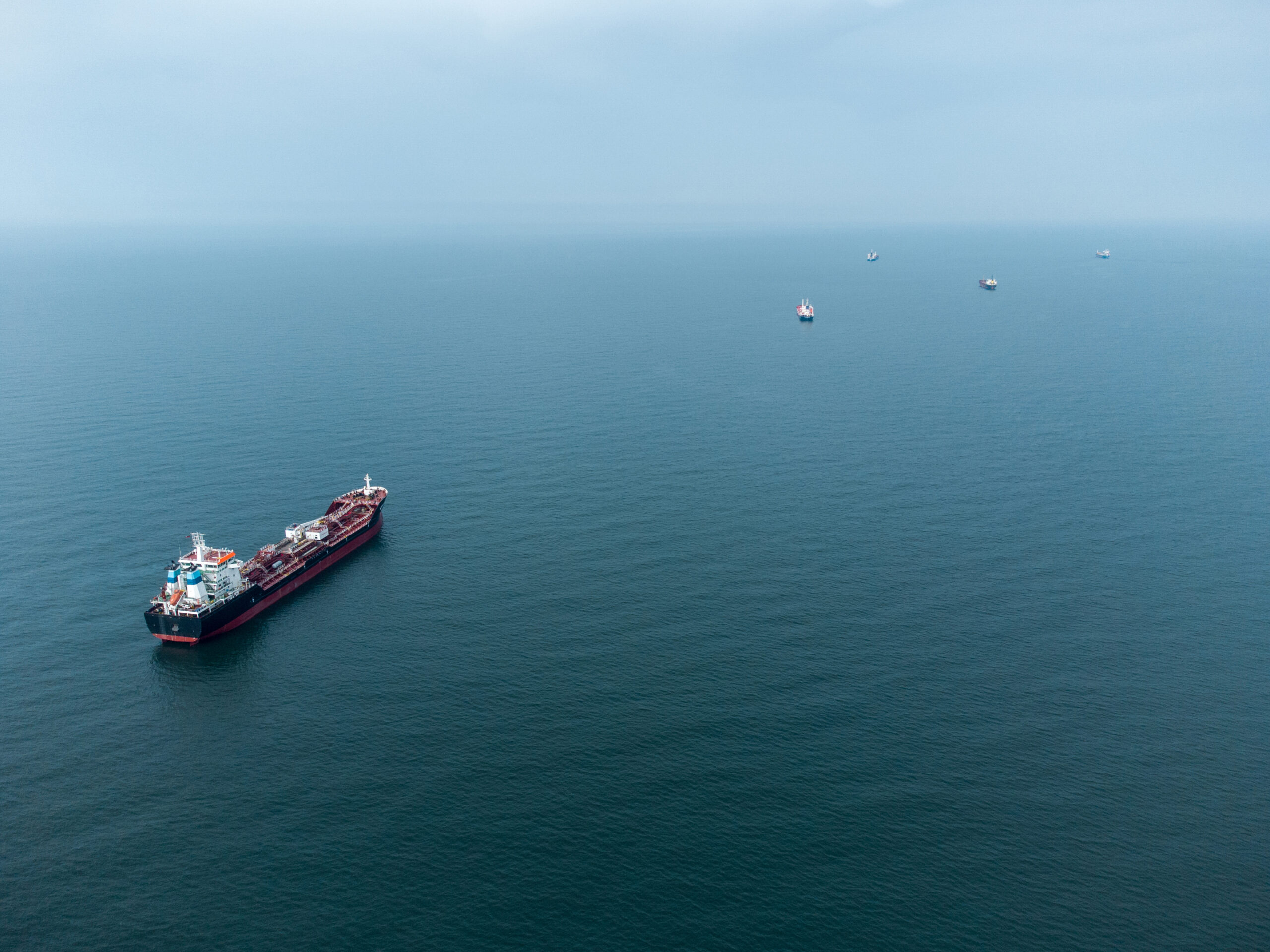 Large general cargo ship tanker bulk carrier, Top down aerial view.