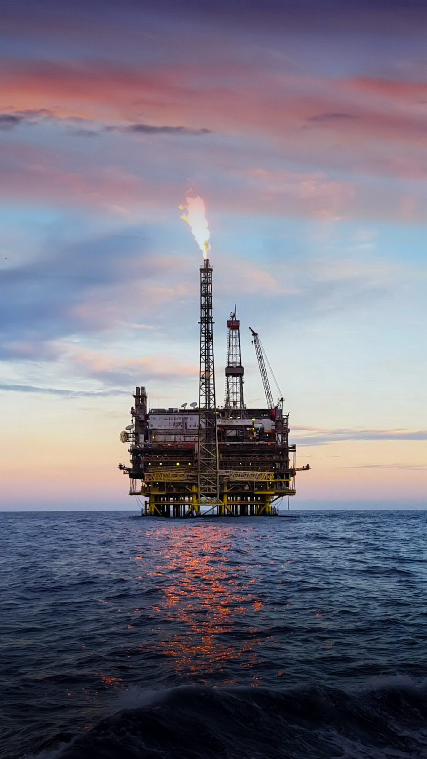 Offshore construction platform for production oil and gas. Oil and gas industry and hard work. Production platform and operation process by manual and auto function from control room.
